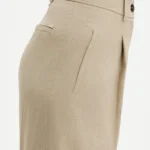 Dettaglio pantaloni donna in misto lino con bottone all'orlo White Wise
